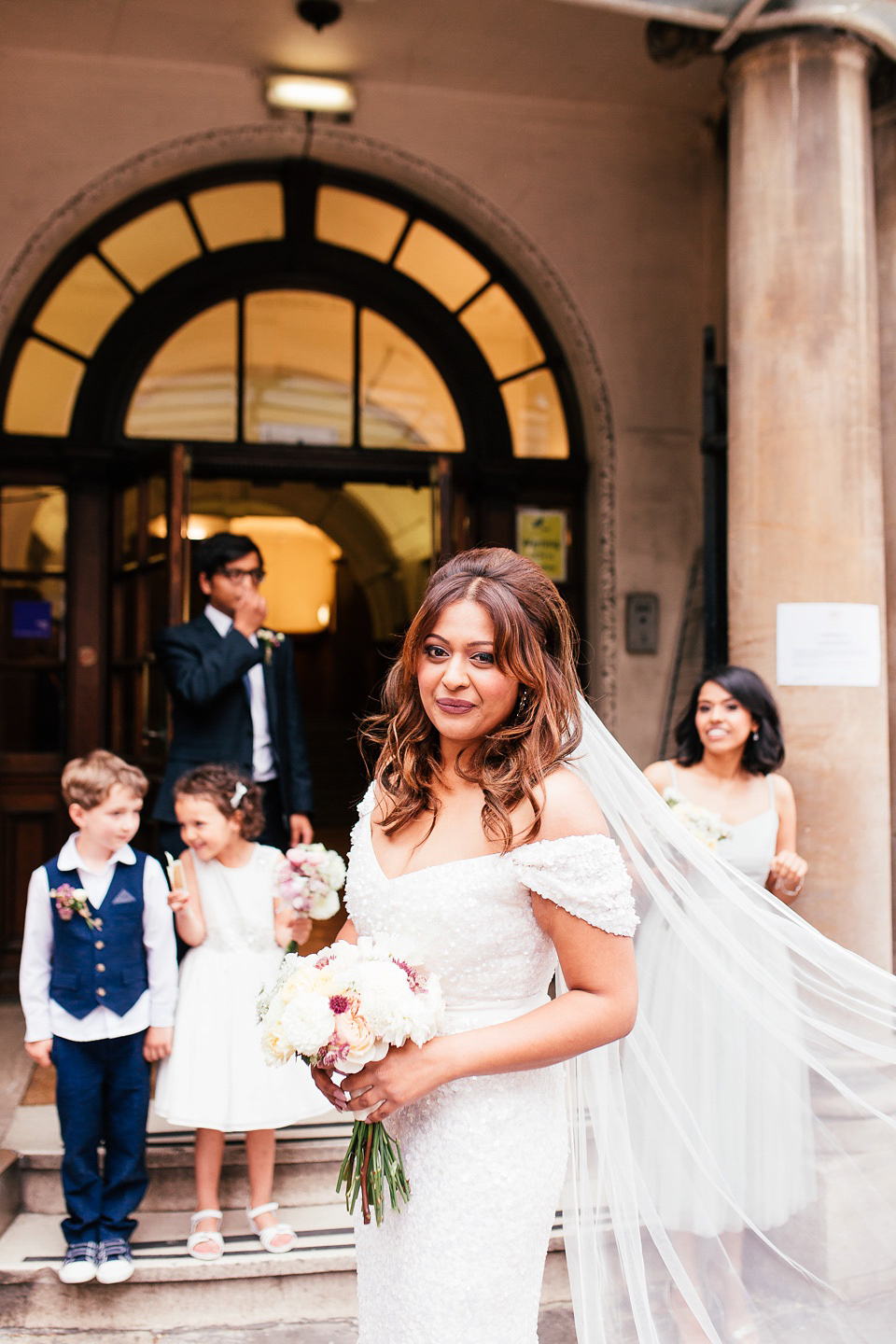 A sequin wedding dress by Karen Willis Holmes for a glamorous and literary inspired London Wedidng. Phtoography by Joanna Nicole.