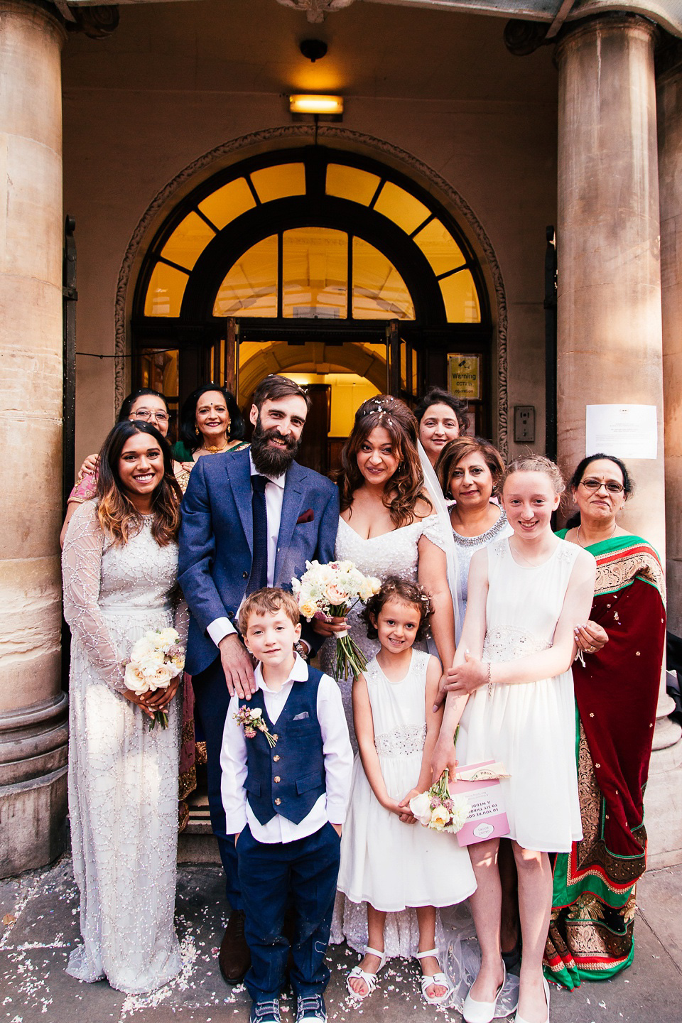 A sequin wedding dress by Karen Willis Holmes for a glamorous and literary inspired London Wedidng. Phtoography by Joanna Nicole.