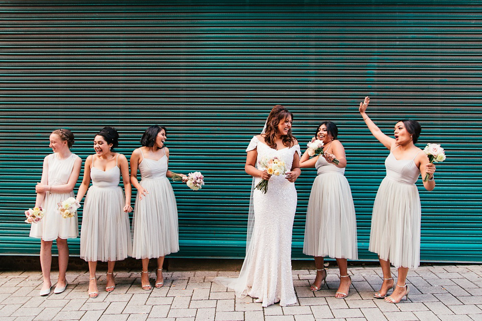 A sequin wedding dress by Karen Willis Holmes for a glamorous and literary inspired London Wedidng. Phtoography by Joanna Nicole.