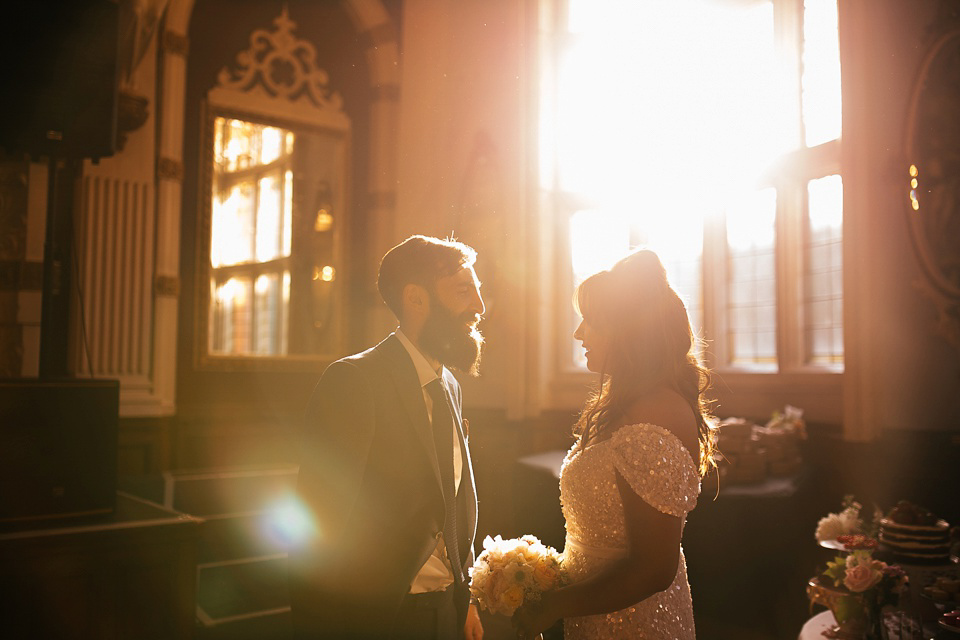 A sequin wedding dress by Karen Willis Holmes for a glamorous and literary inspired London Wedidng. Phtoography by Joanna Nicole.