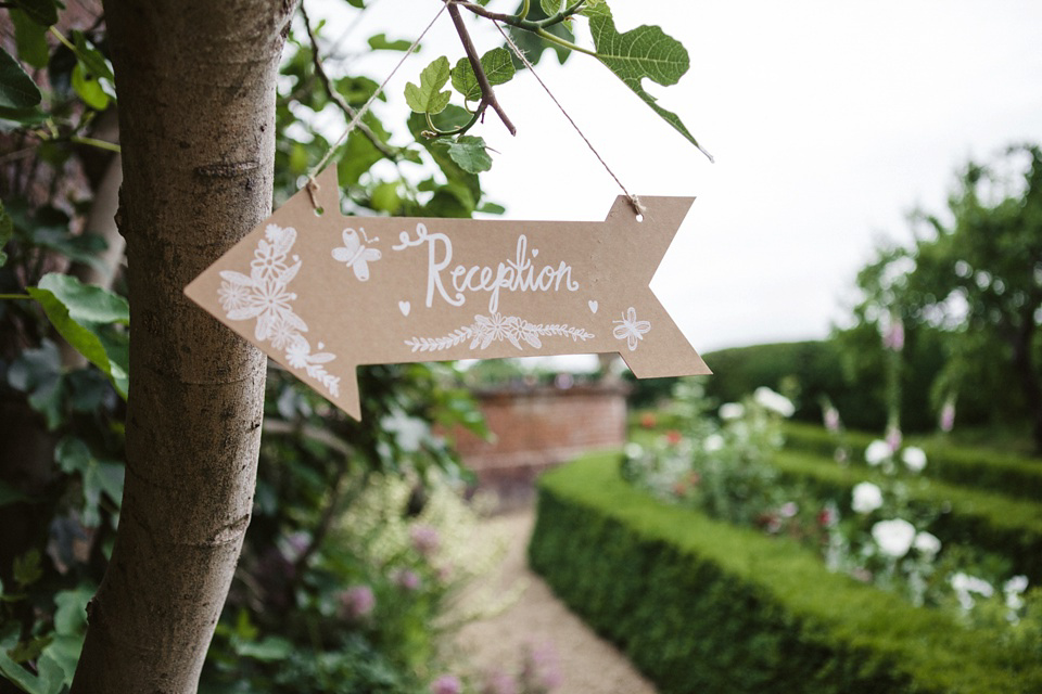 A laid back and colourful 1970's bohemian inspired wedding. Bride Helen wears a dress by Dana Bolton. Images by Horseshoe Photography.