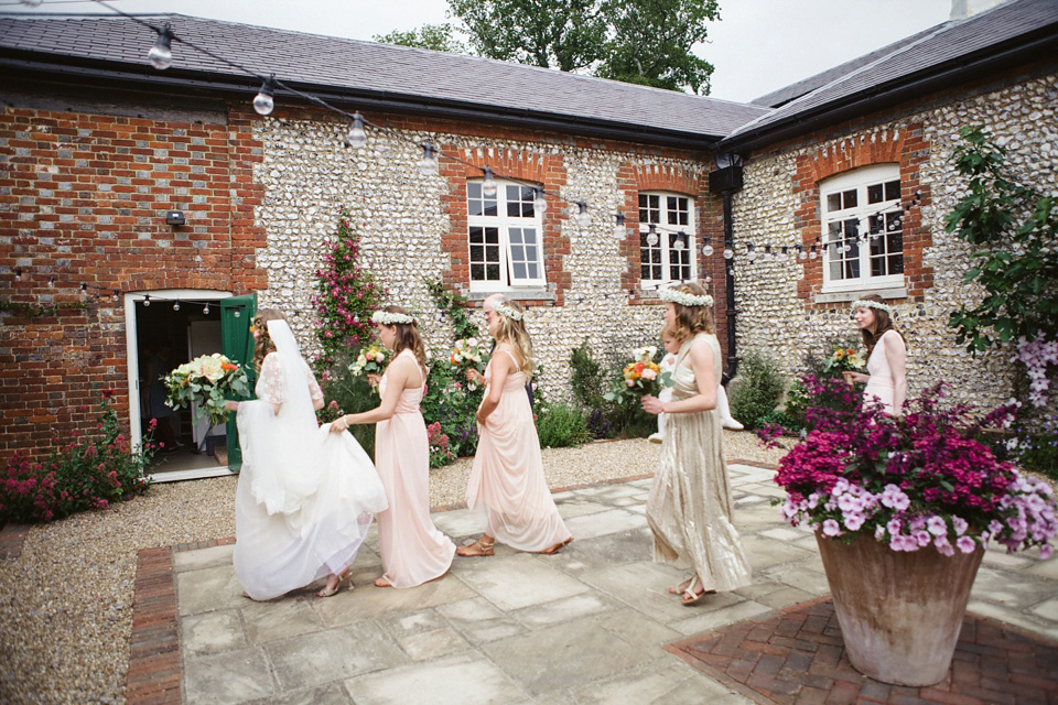 A laid back and colourful 1970's bohemian inspired wedding. Bride Helen wears a dress by Dana Bolton. Images by Horseshoe Photography.