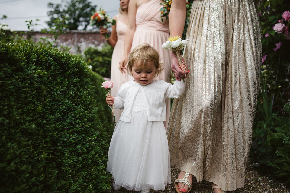 A laid back and colourful 1970's bohemian inspired wedding. Bride Helen wears a dress by Dana Bolton. Images by Horseshoe Photography.