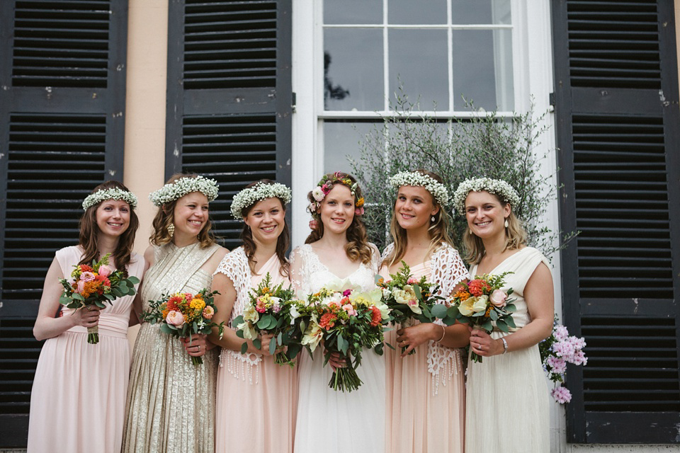 A laid back and colourful 1970's bohemian inspired wedding. Bride Helen wears a dress by Dana Bolton. Images by Horseshoe Photography.