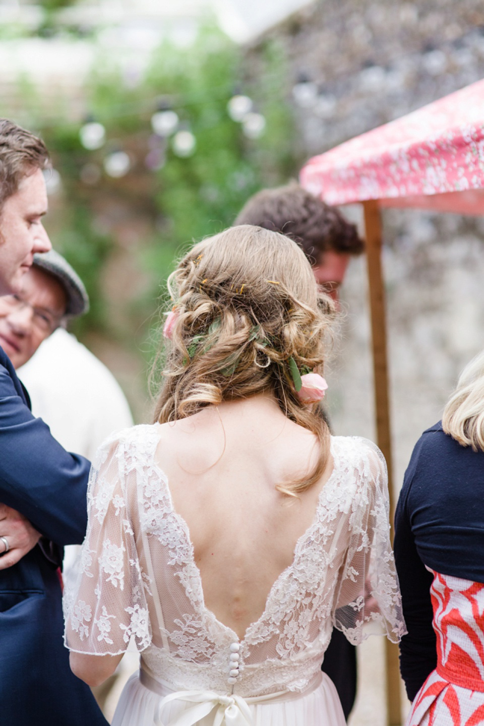 A laid back and colourful 1970's bohemian inspired wedding. Bride Helen wears a dress by Dana Bolton. Images by Horseshoe Photography.