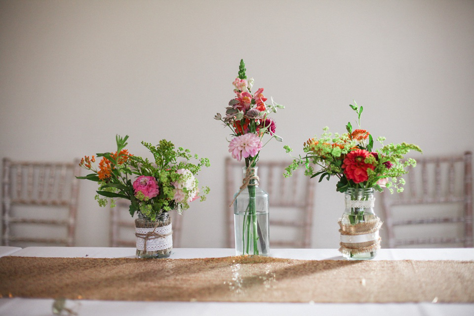 A laid back and colourful 1970's bohemian inspired wedding. Bride Helen wears a dress by Dana Bolton. Images by Horseshoe Photography.