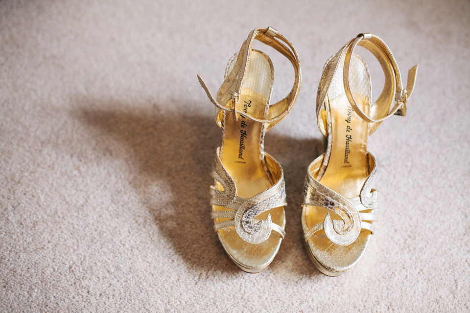 Sophie wears a gold, sequin Phase Eight gown for her wedding at The Norfolk Mead Hotel, an elegant Georgian boutique hotel in the heart of Norfolk. Photography by Joanna Millington.