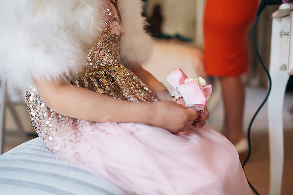 Sophie wears a gold, sequin Phase Eight gown for her wedding at The Norfolk Mead Hotel, an elegant Georgian boutique hotel in the heart of Norfolk. Photography by Joanna Millington.