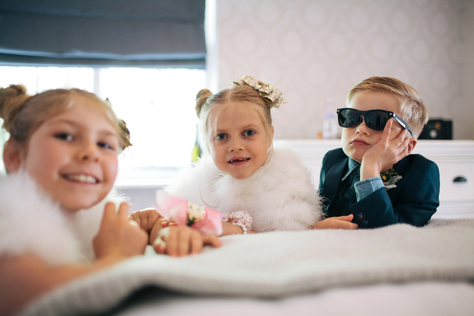 Sophie wears a gold, sequin Phase Eight gown for her wedding at The Norfolk Mead Hotel, an elegant Georgian boutique hotel in the heart of Norfolk. Photography by Joanna Millington.