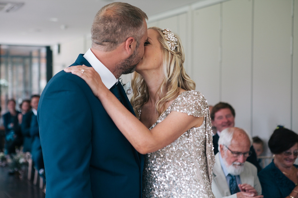 Sophie wears a gold, sequin Phase Eight gown for her wedding at The Norfolk Mead Hotel, an elegant Georgian boutique hotel in the heart of Norfolk. Photography by Joanna Millington.