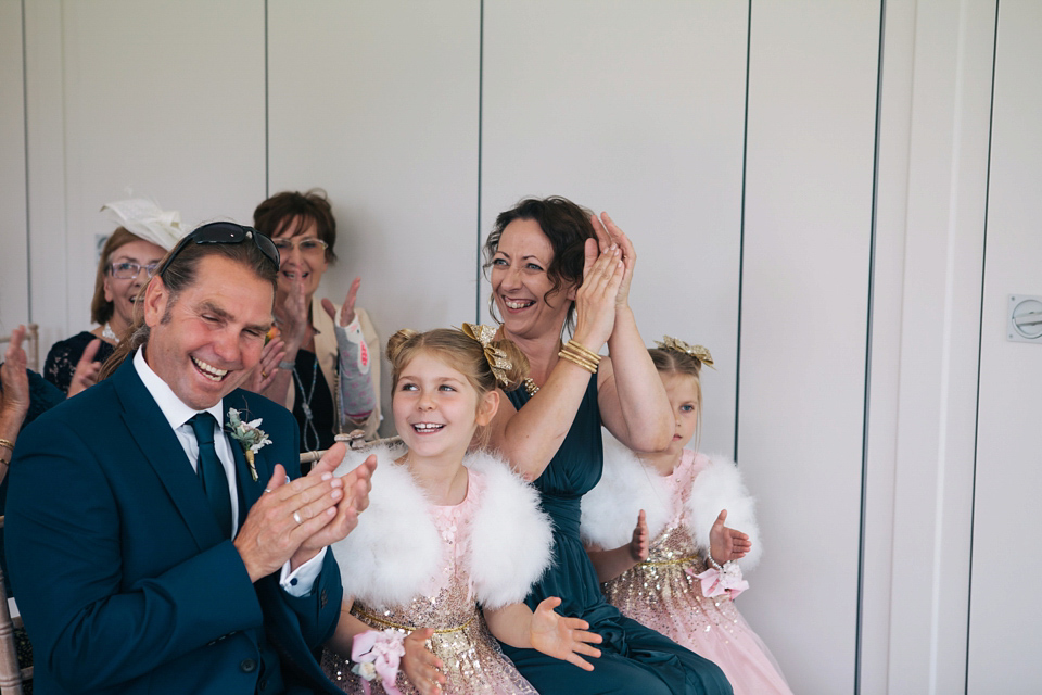 Sophie wears a gold, sequin Phase Eight gown for her wedding at The Norfolk Mead Hotel, an elegant Georgian boutique hotel in the heart of Norfolk. Photography by Joanna Millington.