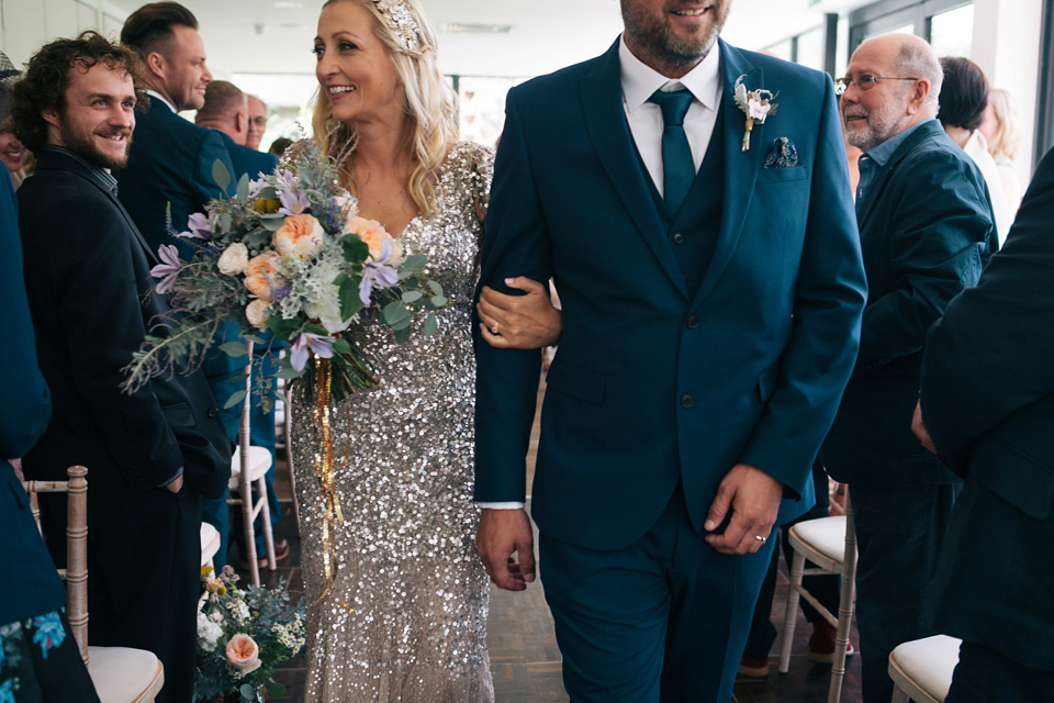 Sophie wears a gold, sequin Phase Eight gown for her wedding at The Norfolk Mead Hotel, an elegant Georgian boutique hotel in the heart of Norfolk. Photography by Joanna Millington.