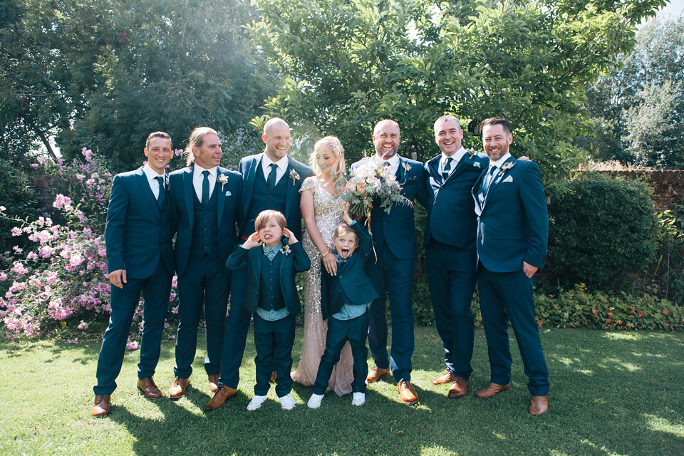 Sophie wears a gold, sequin Phase Eight gown for her wedding at The Norfolk Mead Hotel, an elegant Georgian boutique hotel in the heart of Norfolk. Photography by Joanna Millington.