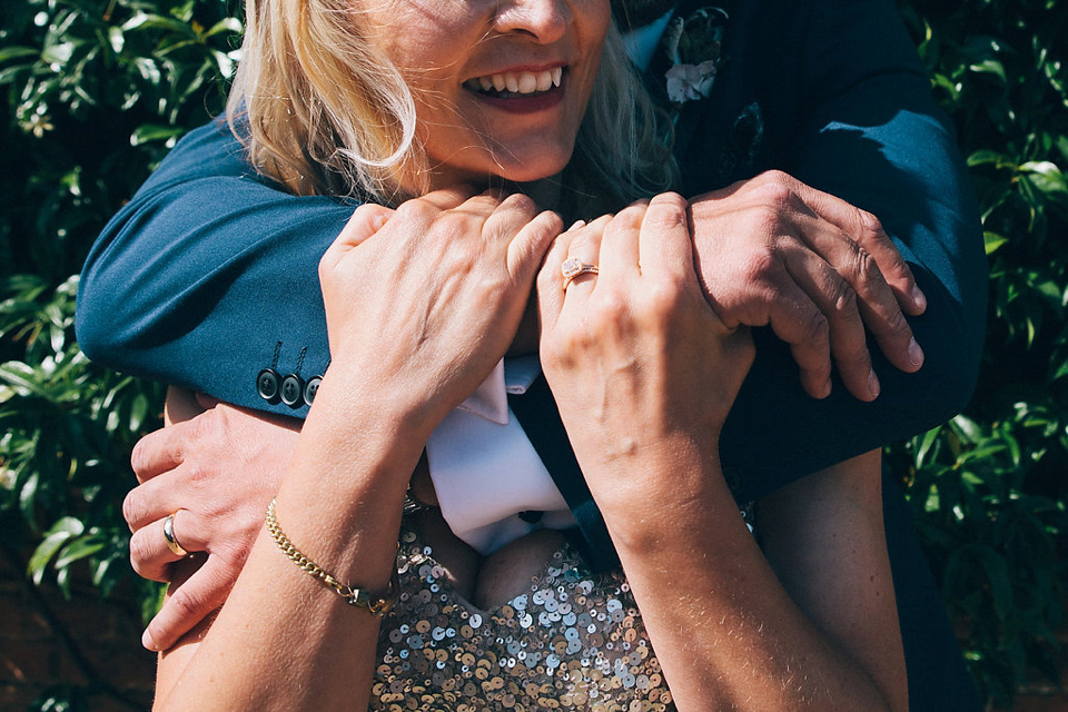 Sophie wears a gold, sequin Phase Eight gown for her wedding at The Norfolk Mead Hotel, an elegant Georgian boutique hotel in the heart of Norfolk. Photography by Joanna Millington.