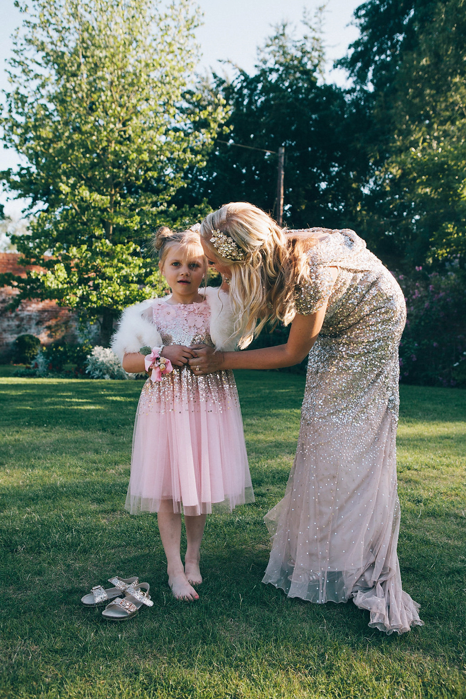 Sophie wears a gold, sequin Phase Eight gown for her wedding at The Norfolk Mead Hotel, an elegant Georgian boutique hotel in the heart of Norfolk. Photography by Joanna Millington.