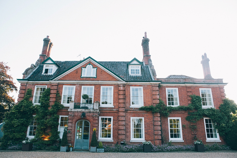 Sophie wears a gold, sequin Phase Eight gown for her wedding at The Norfolk Mead Hotel, an elegant Georgian boutique hotel in the heart of Norfolk. Photography by Joanna Millington.