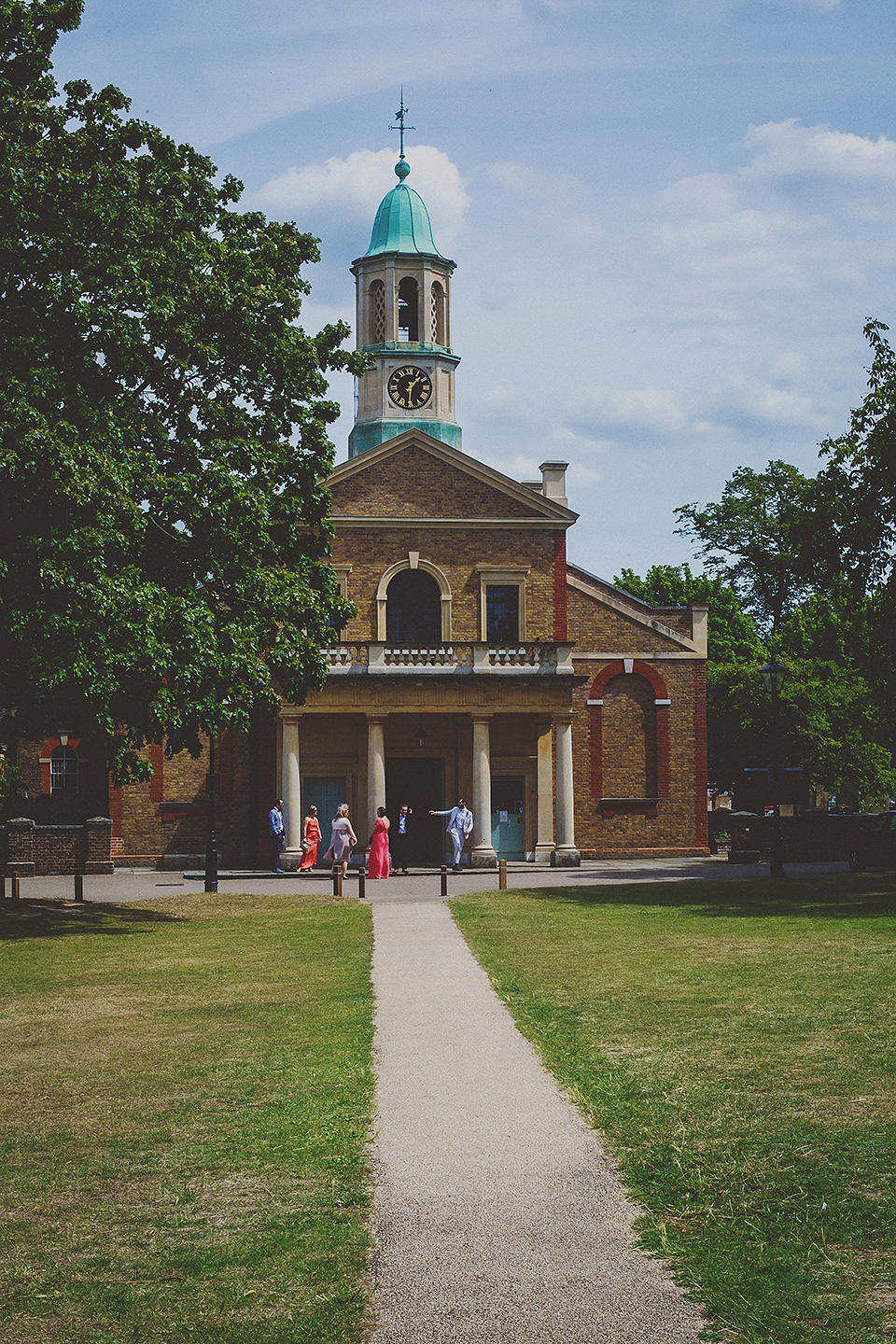 Bride Anna wore a Belle & Bunty gown that she purchased at Miss Bush Bridal of Surrey for her quirky London wedding. Photography by Howell Jones.