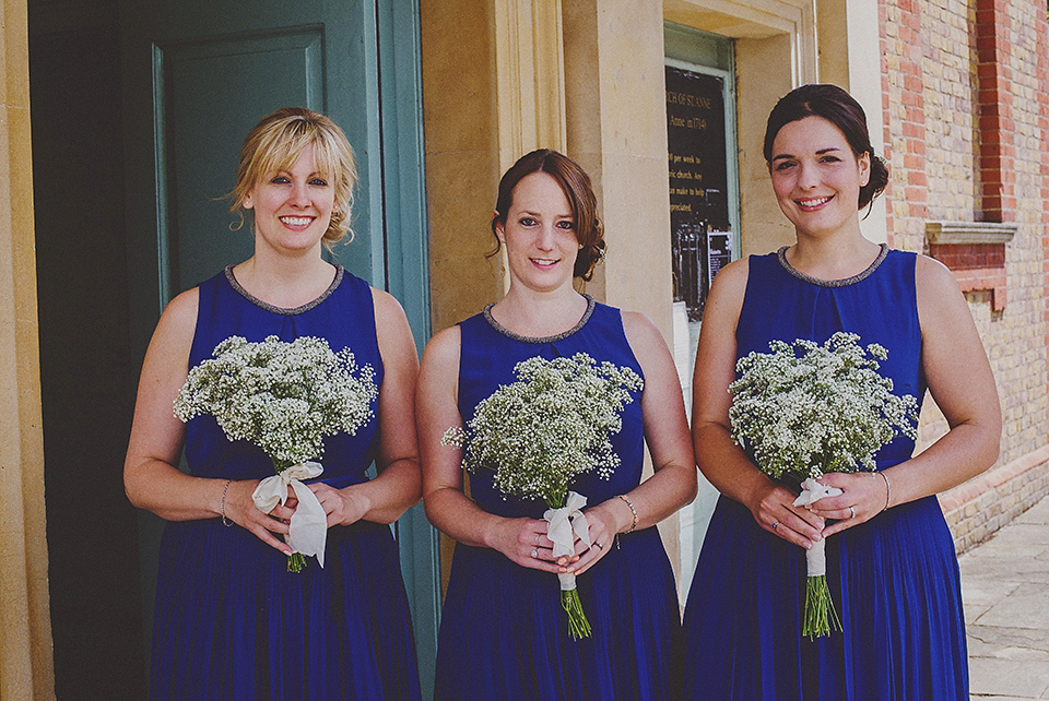 Bride Anna wore a Belle & Bunty gown that she purchased at Miss Bush Bridal of Surrey for her quirky London wedding. Photography by Howell Jones.