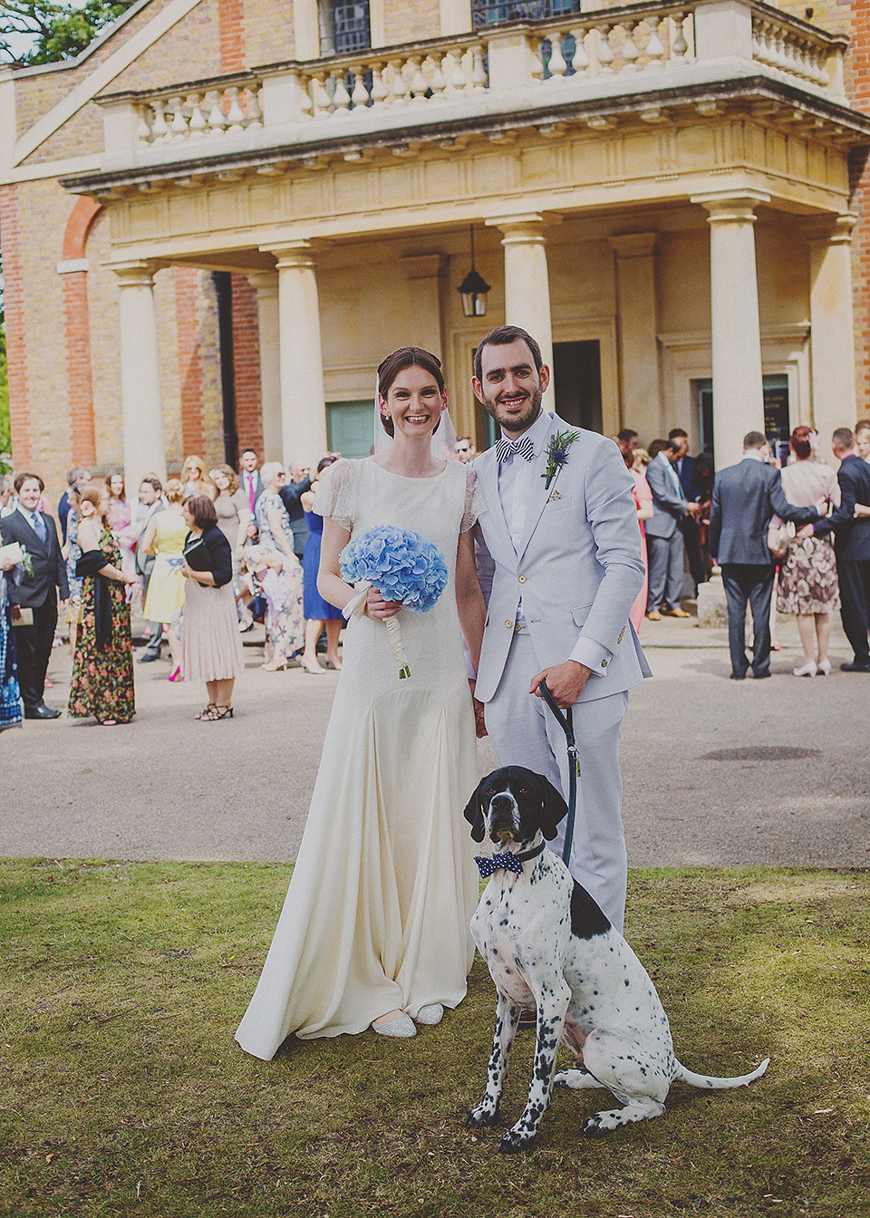 Bride Anna wore a Belle & Bunty gown that she purchased at Miss Bush Bridal of Surrey for her quirky London wedding. Photography by Howell Jones.