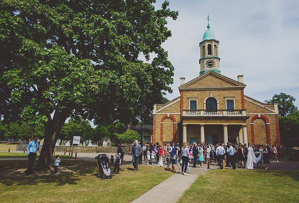 Bride Anna wore a Belle & Bunty gown that she purchased at Miss Bush Bridal of Surrey for her quirky London wedding. Photography by Howell Jones.