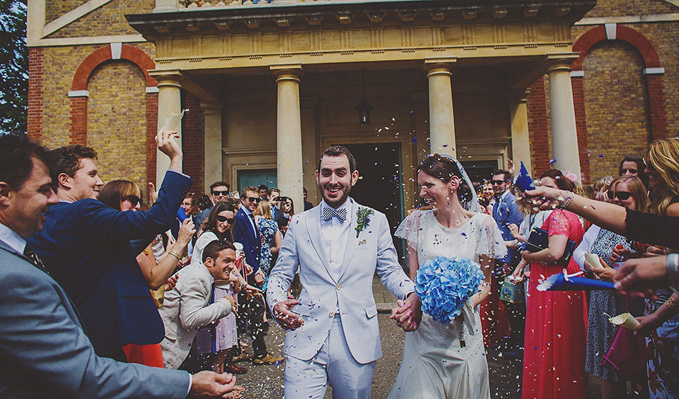 Bride Anna wore a Belle & Bunty gown that she purchased at Miss Bush Bridal of Surrey for her quirky London wedding. Photography by Howell Jones.