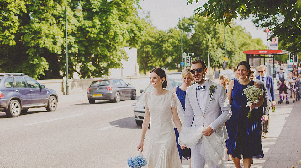 Bride Anna wore a Belle & Bunty gown that she purchased at Miss Bush Bridal of Surrey for her quirky London wedding. Photography by Howell Jones.