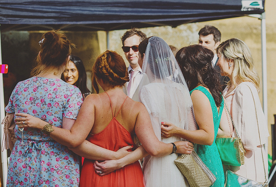 Bride Anna wore a Belle & Bunty gown that she purchased at Miss Bush Bridal of Surrey for her quirky London wedding. Photography by Howell Jones.