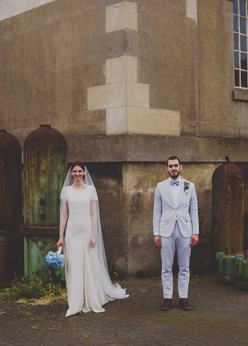 Bride Anna wore a Belle & Bunty gown that she purchased at Miss Bush Bridal of Surrey for her quirky London wedding. Photography by Howell Jones.