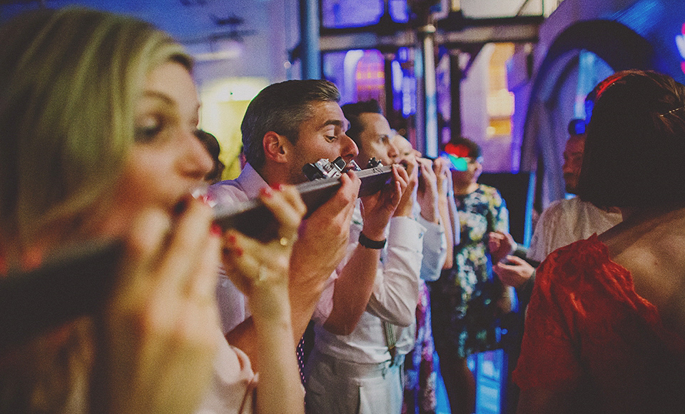 Bride Anna wore a Belle & Bunty gown that she purchased at Miss Bush Bridal of Surrey for her quirky London wedding. Photography by Howell Jones.