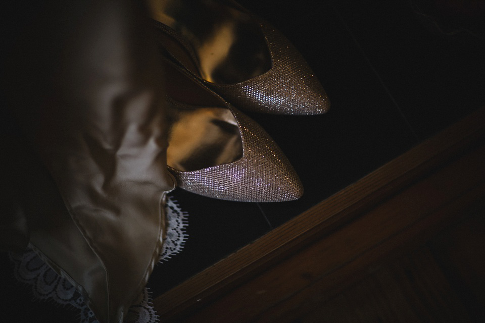 Bride Charlene wears a bespoke gown by Sheffield based designer, Kate Beaumont, for her wedding at Stockport Town Hall. Photography by DSB Creative.