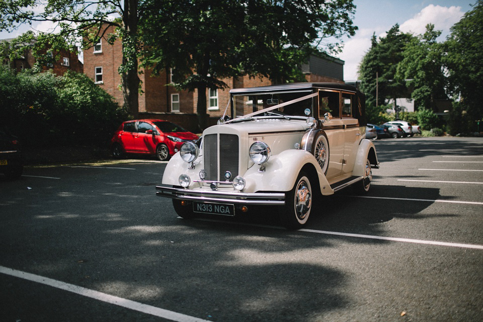 Bride Charlene wears a bespoke gown by Sheffield based designer, Kate Beaumont, for her wedding at Stockport Town Hall. Photography by DSB Creative.