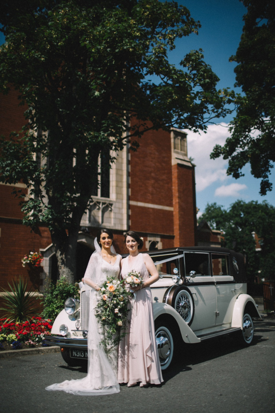 Bride Charlene wears a bespoke gown by Sheffield based designer, Kate Beaumont, for her wedding at Stockport Town Hall. Photography by DSB Creative.