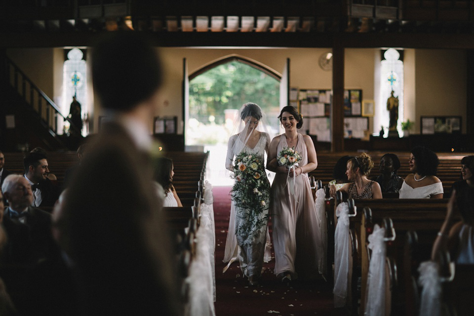 Bride Charlene wears a bespoke gown by Sheffield based designer, Kate Beaumont, for her wedding at Stockport Town Hall. Photography by DSB Creative.