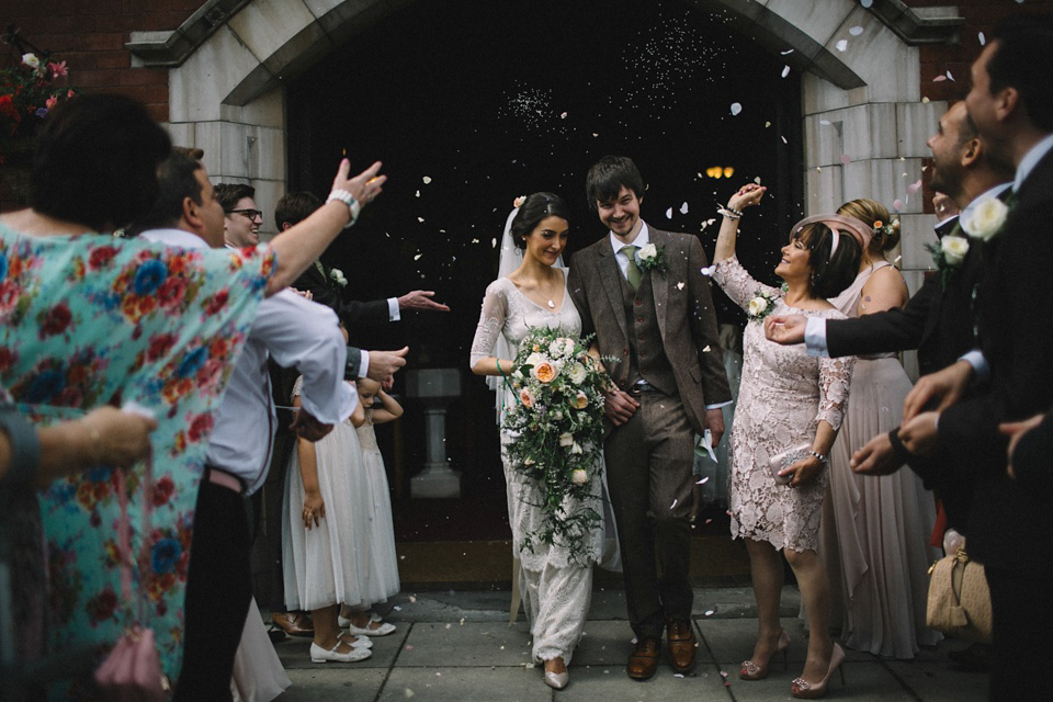 Bride Charlene wears a bespoke gown by Sheffield based designer, Kate Beaumont, for her wedding at Stockport Town Hall. Photography by DSB Creative.