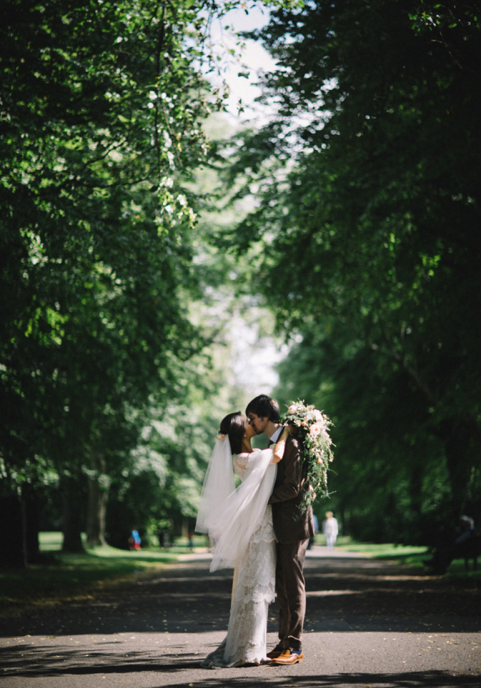 Bride Charlene wears a bespoke gown by Sheffield based designer, Kate Beaumont, for her wedding at Stockport Town Hall. Photography by DSB Creative.