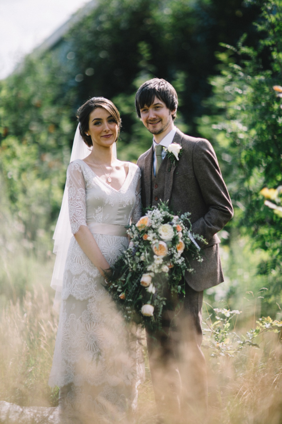 Bride Charlene wears a bespoke gown by Sheffield based designer, Kate Beaumont, for her wedding at Stockport Town Hall. Photography by DSB Creative.