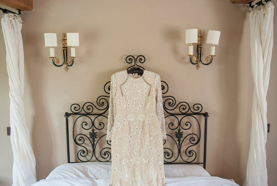 Bride Frances wears a gown by Needle & Thread for her Dewsall Court spring wedding. Images by Benjamin Wetherall of BPW Photography.