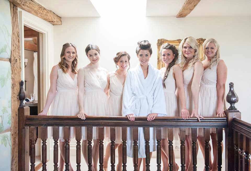 Bride Frances wears a gown by Needle & Thread for her Dewsall Court spring wedding. Images by Benjamin Wetherall of BPW Photography.