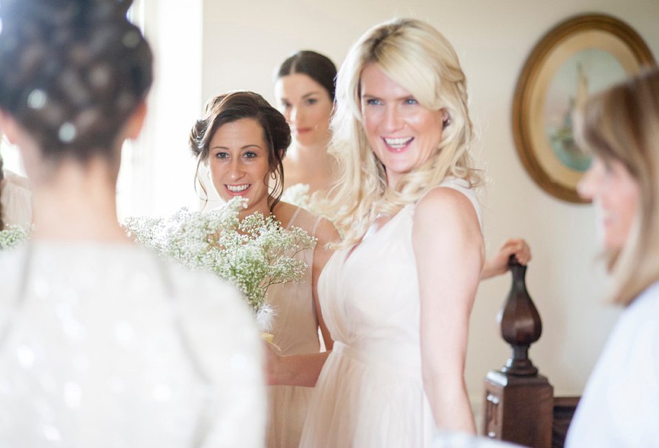 Bride Frances wears a gown by Needle & Thread for her Dewsall Court spring wedding. Images by Benjamin Wetherall of BPW Photography.