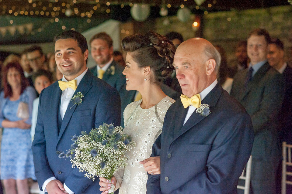 Bride Frances wears a gown by Needle & Thread for her Dewsall Court spring wedding. Images by Benjamin Wetherall of BPW Photography.