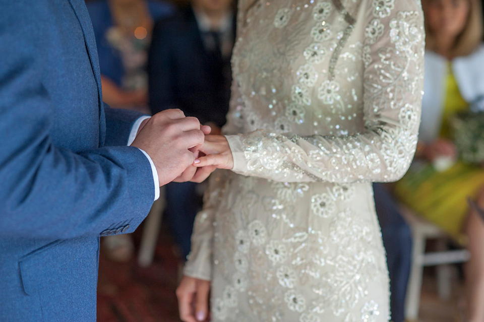 Bride Frances wears a gown by Needle & Thread for her Dewsall Court spring wedding. Images by Benjamin Wetherall of BPW Photography.