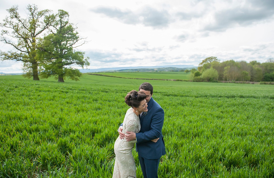 Bride Frances wears a gown by Needle & Thread for her Dewsall Court spring wedding. Images by Benjamin Wetherall of BPW Photography.