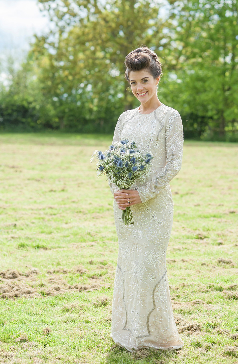 Bride Frances wears a gown by Needle & Thread for her Dewsall Court spring wedding. Images by Benjamin Wetherall of BPW Photography.