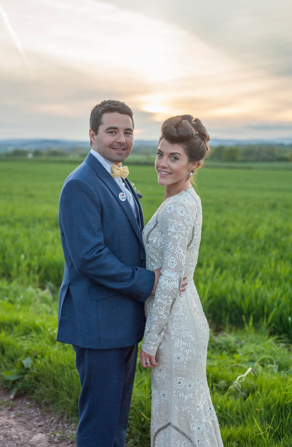 Bride Frances wears a gown by Needle & Thread for her Dewsall Court spring wedding. Images by Benjamin Wetherall of BPW Photography.