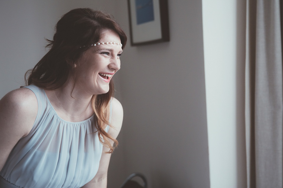 Lianne wears a Jesus Peiro gown for her family focussed wedding in The Cotswolds. Photography by Philippa James.