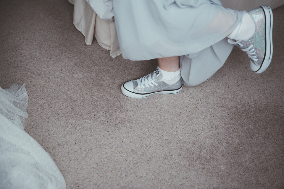 Lianne wears a Jesus Peiro gown for her family focussed wedding in The Cotswolds. Photography by Philippa James.