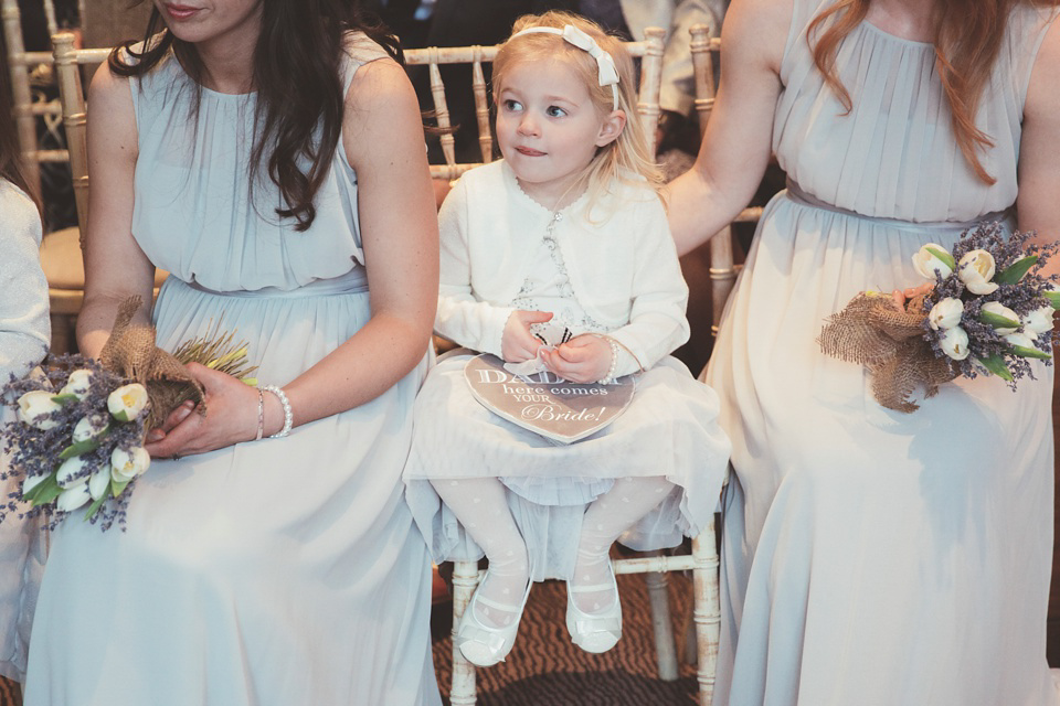 Lianne wears a Jesus Peiro gown for her family focussed wedding in The Cotswolds. Photography by Philippa James.