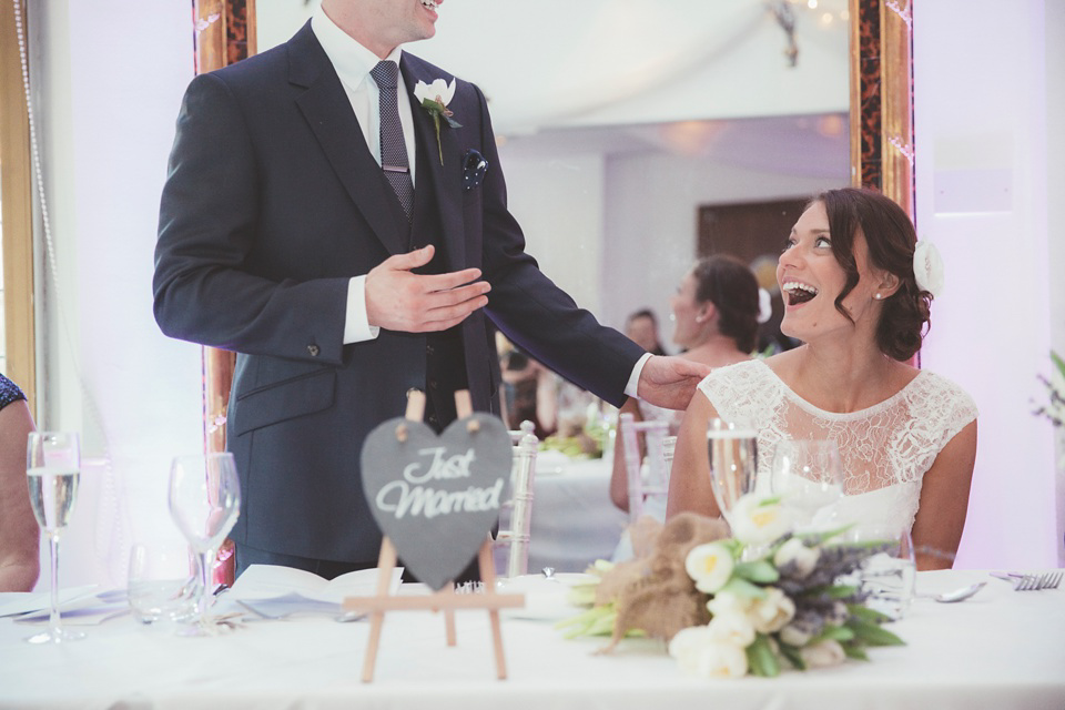 Lianne wears a Jesus Peiro gown for her family focussed wedding in The Cotswolds. Photography by Philippa James.