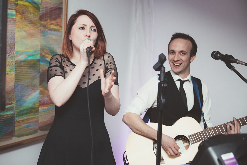 Lianne wears a Jesus Peiro gown for her family focussed wedding in The Cotswolds. Photography by Philippa James.