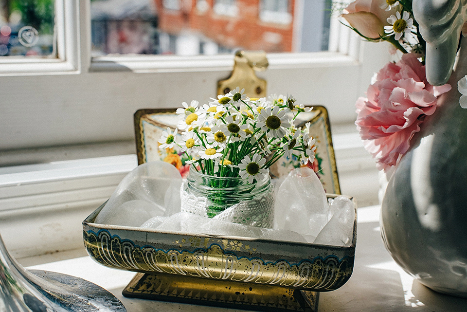 Bride Amy wears a replica 1960s wedding dress, designed by Fur Coat No Knickers of London, for her quirky and kitsch wedding. Photography by Jacqui McSweeney.